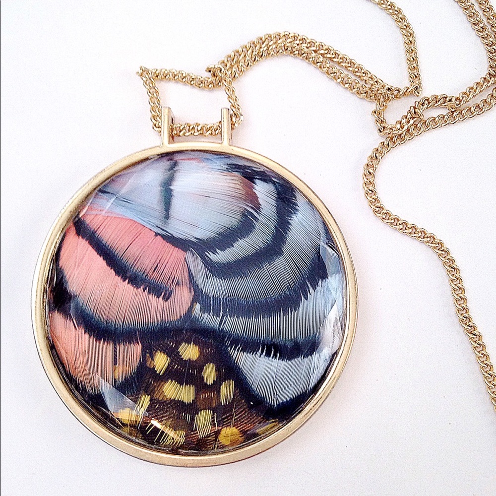 Rare Anthropologie Nevermore Feather Pendant.